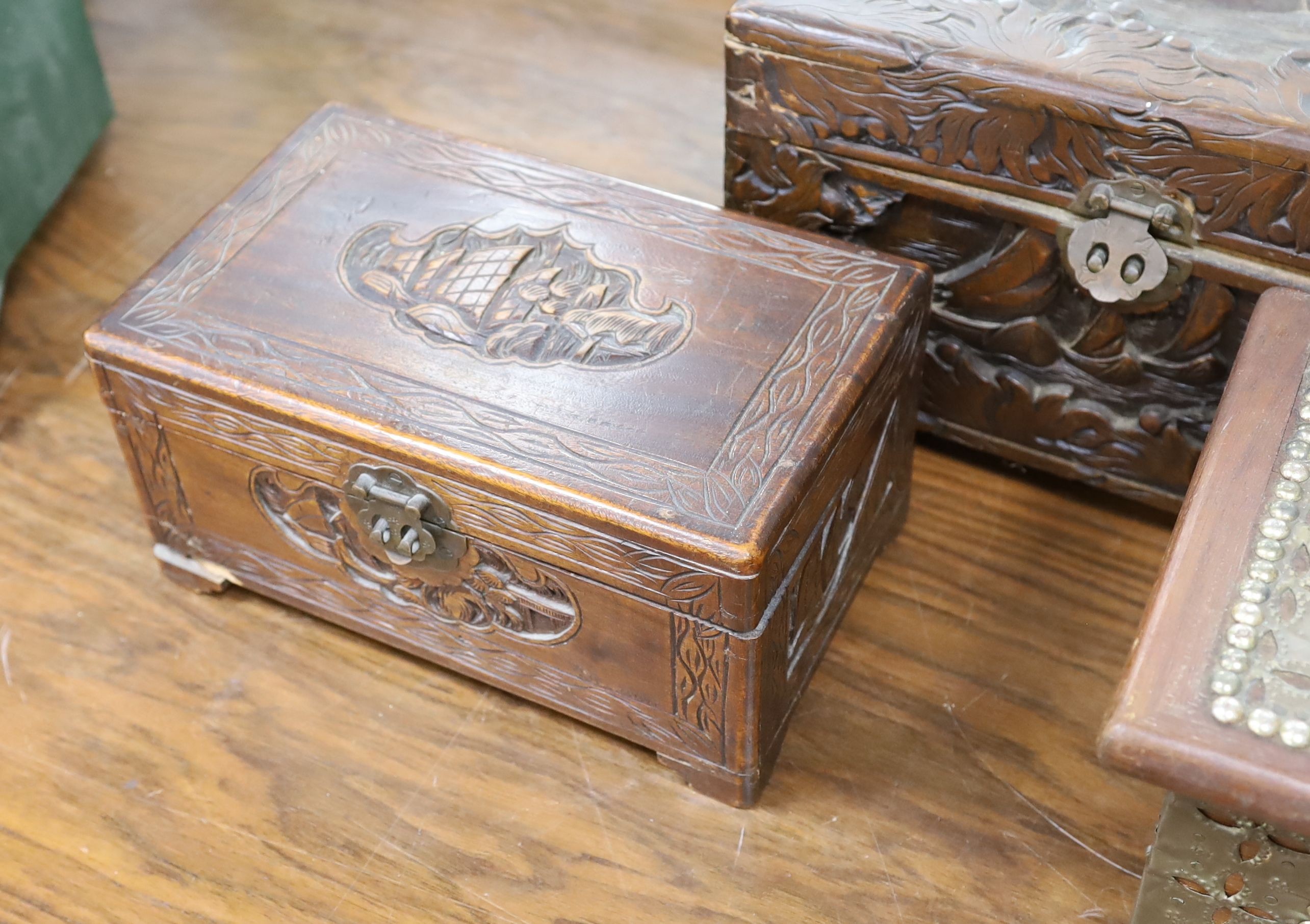 A Chinese carved camhor wood chest and three assorted boxes, Camphor chest 35 cms wide x22 cms high.